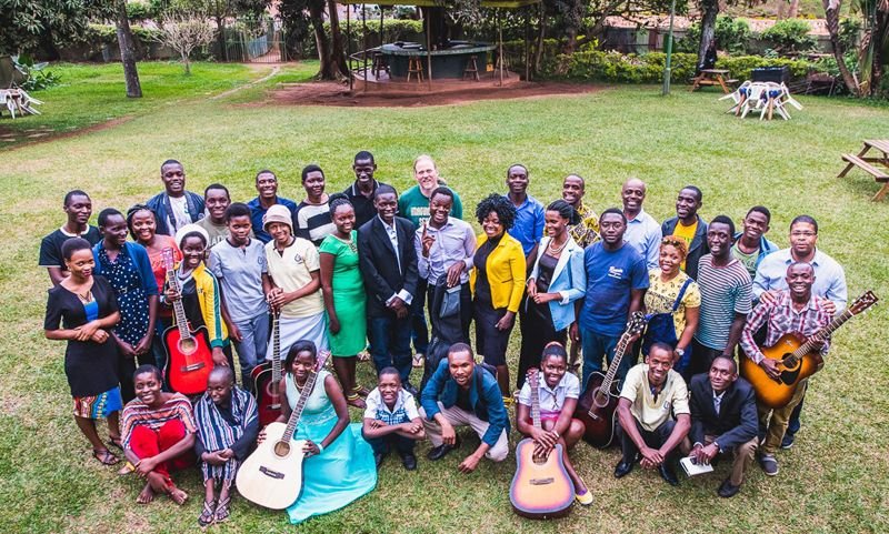 Students and teachers with their guitars