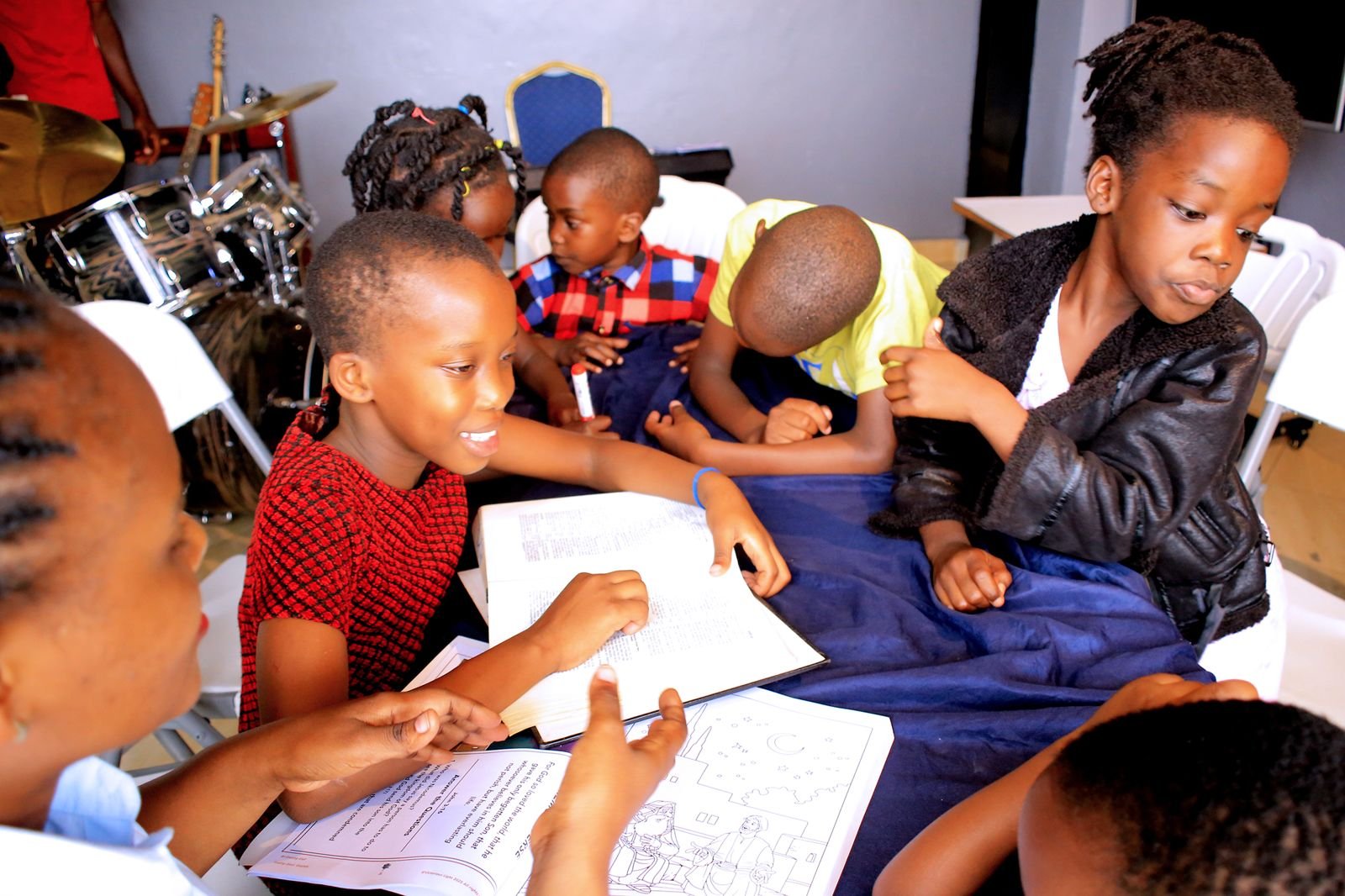 Children reading the Bible together